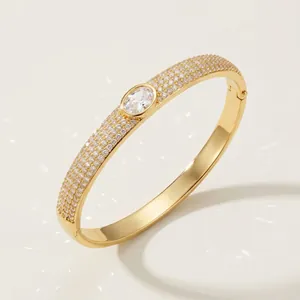 Elegant luxury gold plated bangle encrusted with sparkling cubic zirconia for women