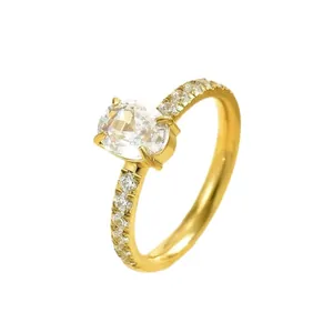 Elegant gold-plated stainless steel ring with a large oval center stone and pavé band.