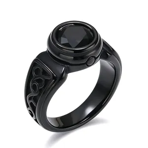 Close-up detail of a men's retro black titanium steel ring with a faceted black gemstone