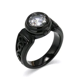Macro detail of men's retro black titanium steel ring with sparkling round gemstone