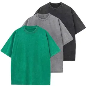Vintage gewaschene Oversized-T-Shirts aus Baumwolle in Grün, Grau und Schwarz - Detail.