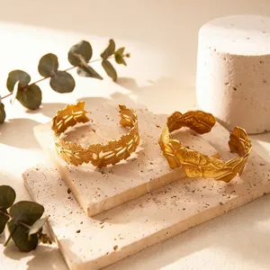 Exquisite gold-plated stainless steel leaf cuff bracelets featuring a minimalist design
