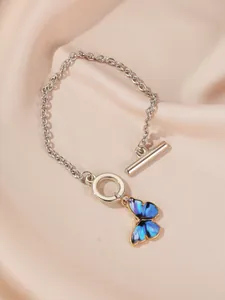 Elegant silver chain bracelet featuring a detailed blue butterfly pendant and OT clasp