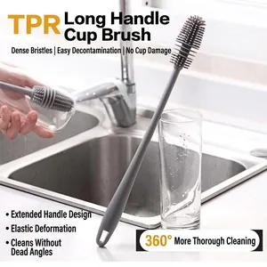 Long handle gray silicone cup brush for 360-degree deep cleaning in home kitchen sinks.