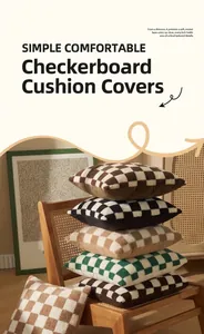 Close-up of multi-color checkered lamb wool cushion covers stacked on a chair