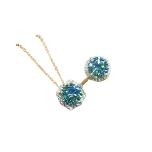 Elegant 3ct blue-green halo pendant and ring set with heart and arrow cut