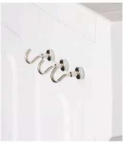 Set of three heavy-duty silver magnetic hooks on a white surface for organization.