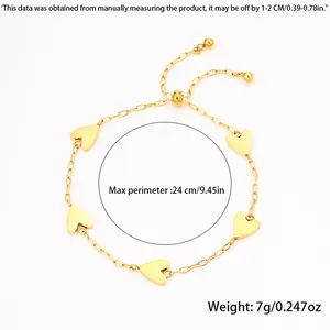 Detailed view of adjustable gold stainless steel heart charm bracelet with 24cm max perimeter