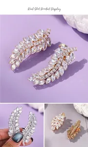Elegant leaf-shaped crystal hair clips featuring marquise-cut stones and silver finish.