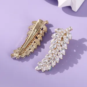 Elegant leaf-shaped zircon hair clip with marquise cut stones in gold-tone metal setting
