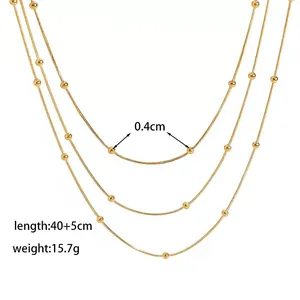 Collier à trois rangs de perles dorées pour femmes en acier inoxydable poli brillant
