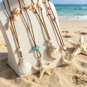 Detailed macro view of bohemian necklaces featuring natural shell and starfish pendants