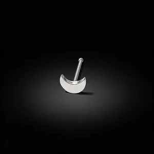 Detailed view of a minimalist silver crescent moon nose stud with a straight post design.