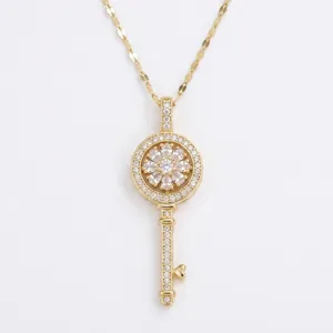Collier pendentif clé fleur en zircon rotatif élégant en acier titane doré