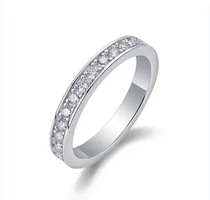 Detail shot of an elegant S925 sterling silver eternity ring with sparkling moissanite