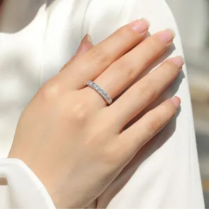 Elegant S925 sterling silver eternity band ring with micro-pave moissanite stones
