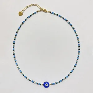 Close-up detail of the Evil Eye beaded necklace featuring colorful mixed seed beads