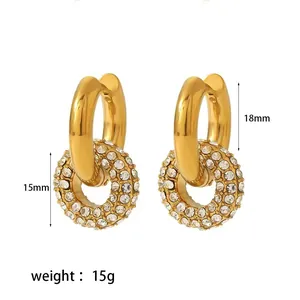 Close-up of gold hoop earrings with detachable crystal rings showing dimensions.