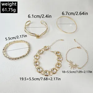 Detailed macro view of 5-piece gold-tone vintage bracelet set with size measurements