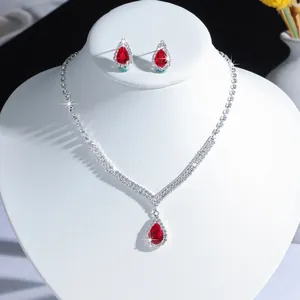 Elegant wedding jewelry set featuring a red teardrop zircon necklace and stud earrings