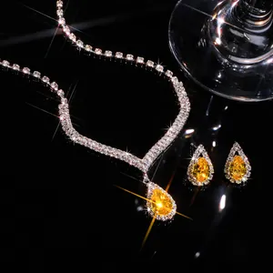 Close-up of yellow water drop zircon necklace and earrings bridal jewelry set