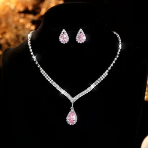 Elegant wedding jewelry set featuring pink pear-shaped zircon necklace and earrings