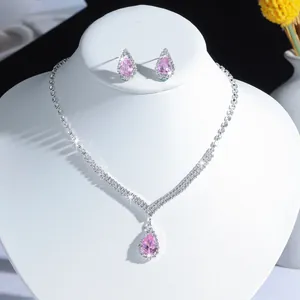 Elegant bridal jewelry set featuring a pink pear-cut zircon necklace and matching earrings