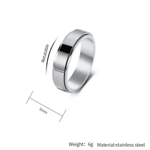 Detailed macro shot of 6mm stainless steel rotatable spinner ring in silver finish