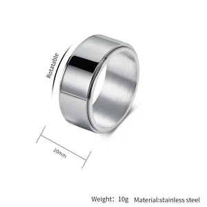 Close-up detail of a 10mm wide rotatable stainless steel ring showing its weight and material