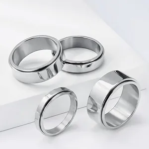 Minimalist stainless steel spinner rings in various widths, polished plain bands for men and women
