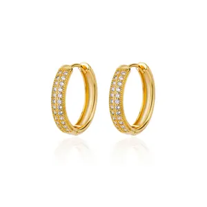 Elegant gold-plated hoop earrings with three rows of pavé zircons and a clean reflection.