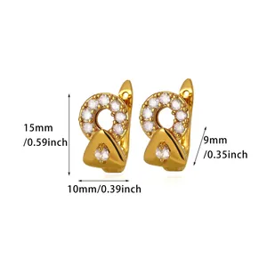 Gold geometric earrings with round and triangle CZ studs showing product dimensions