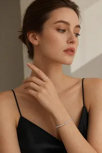 Elegant S925 sterling silver moissanite tennis bracelet and ring set on model.