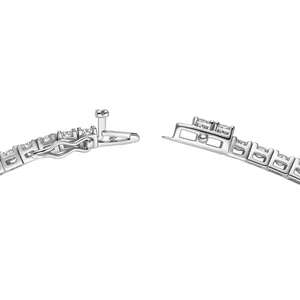 Detailed macro view of a secure double-locking box clasp on a silver tennis bracelet