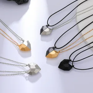 Magnetic heart-shaped necklaces for couples in polished gold, silver, and black finishes