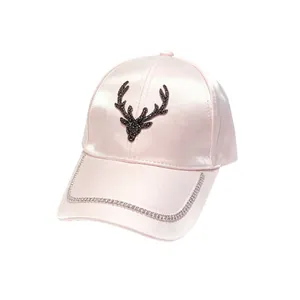 Pink satin breathable baseball cap featuring rhinestone deer head and sparkling chain detail