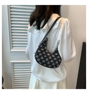 Stylish checkered crescent hobo bag for women featuring frayed fabric texture detail