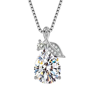 Macro view of teardrop crystal pendant with shimmering zircon leaf detail