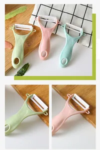Kitchen ceramic vegetable and fruit peelers in pink, green and blue pastel colors