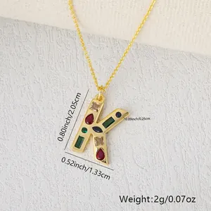 Detail view of colorful zircon letter K pendant necklace with size and weight measurements