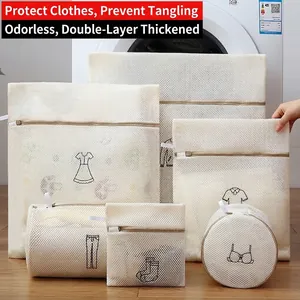 Detailed view of multi-size white mesh laundry bags set for delicate clothing and bras