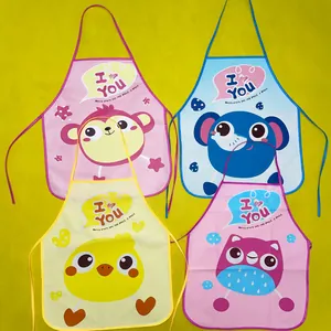 Detail view showing four different colorful cartoon animal waterproof aprons for kids