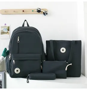 Detailed display of a 4-piece minimalist dark grey school backpack set including a tote and pouch