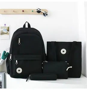 Comprehensive black 4-piece student backpack set featuring tote bag and pencil case