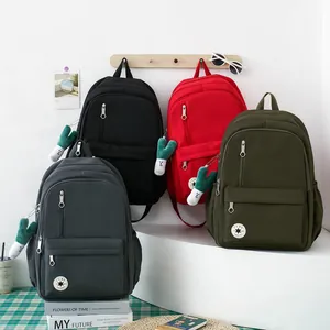 Minimalist lightweight large capacity school backpacks in four colors with cactus charm.
