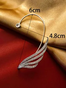 Detail view of silver leaf ear cuff with 6cm and 4.8cm size annotations