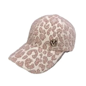 Stylish leopard print plush baseball cap featuring a decorative metal M logo for winter.