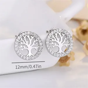 Detailed view of S925 sterling silver Tree of Life stud earrings with sparkling cubic zirconia