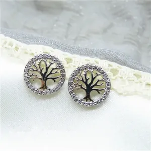 Detailed view of Tree of Life silver stud earrings with sparkling cubic zirconia stones