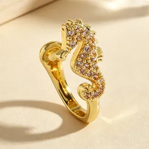 Macro detail of a creative golden seahorse nose clip inlaid with sparkling zircons